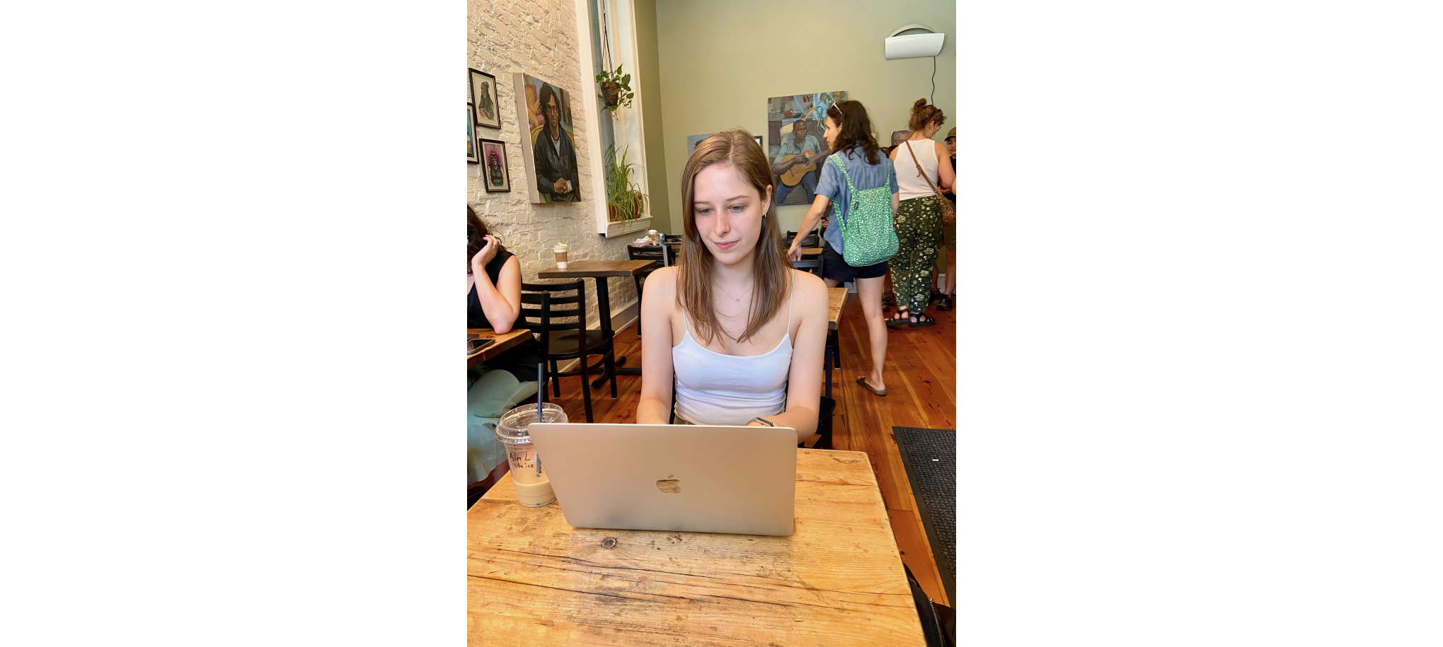 Miette doing virtual research in a coffee shop!